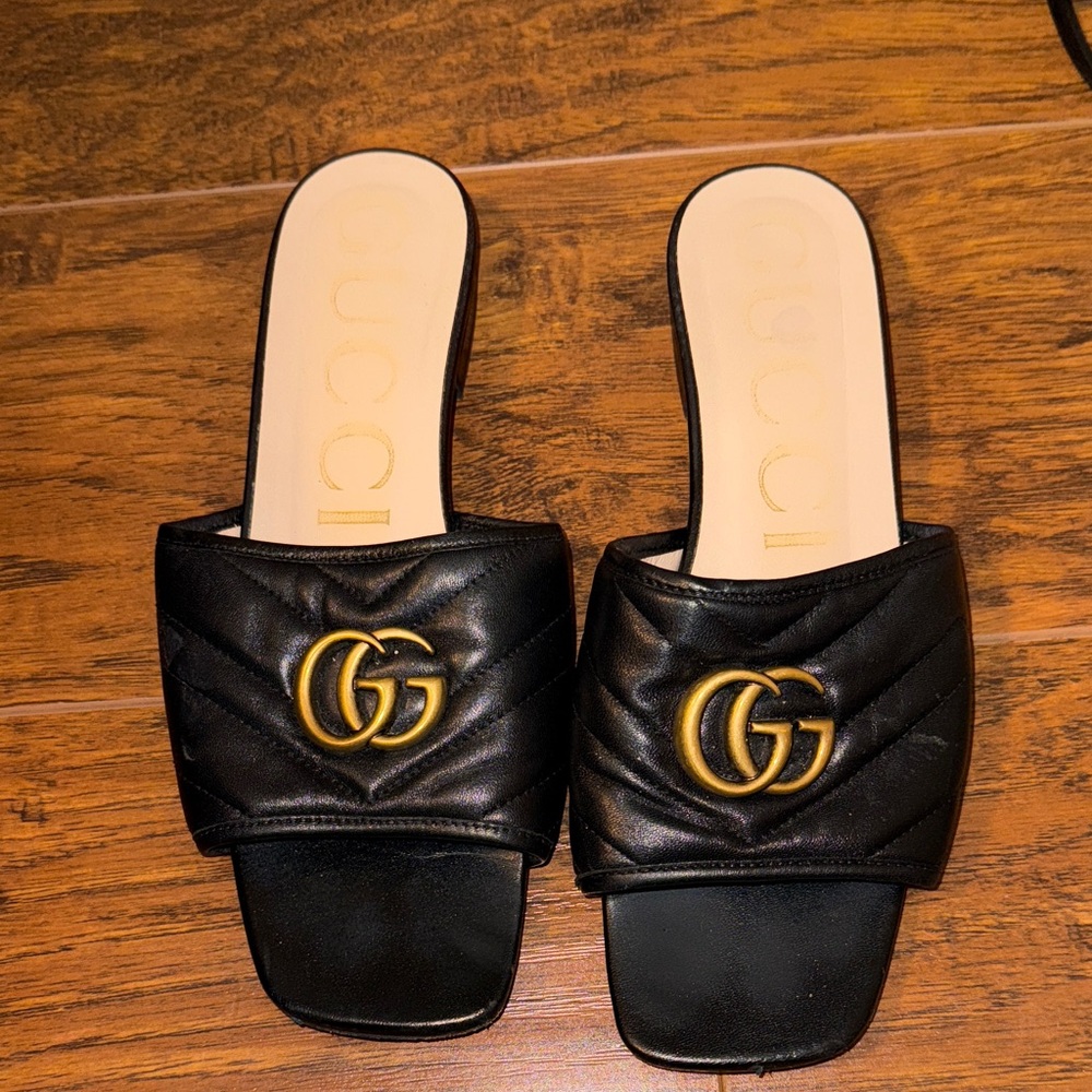Gucci Black and Gold Quilted Mules